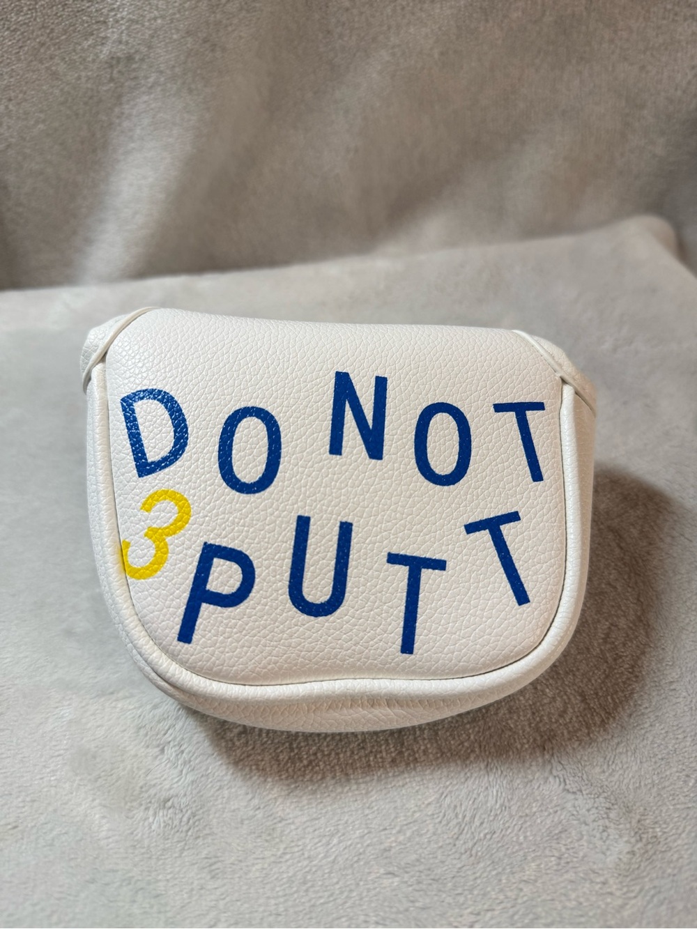 Source Unknown White Putter Cover with Blue and Yellow Lettering
